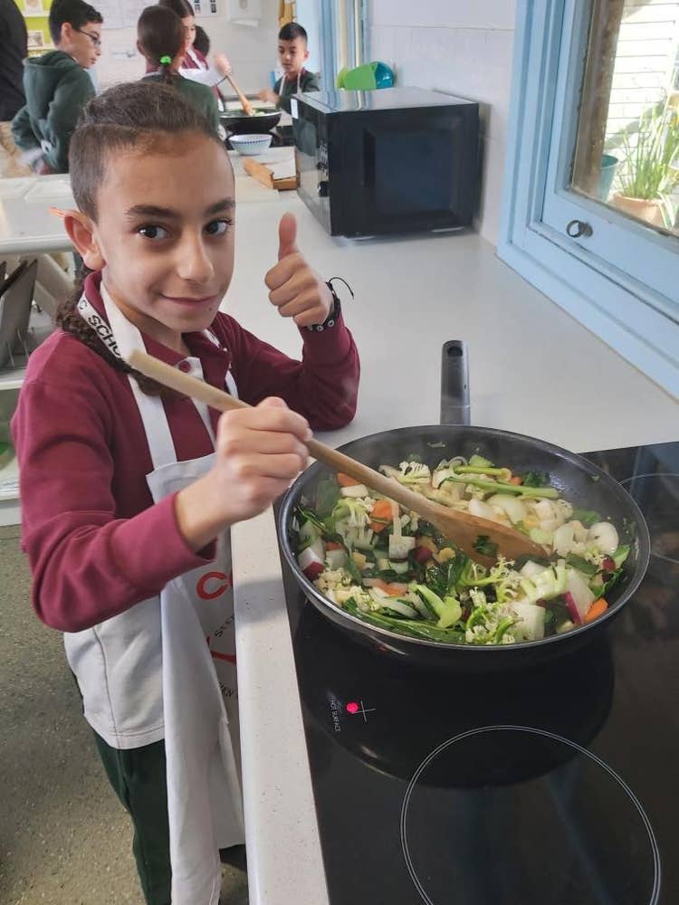 May be an image of 6 people and wooden spoon